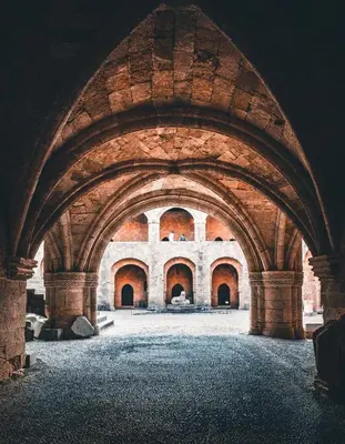 an archway in an old building with brick walls at Emerald Dream House#Poiessa, Medieval Town in Rhodes Town