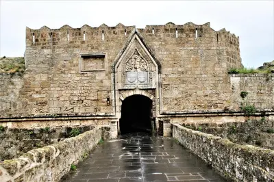 an entrance to a castle with a tunnel at Evangelia's Little House in Rhodes Town