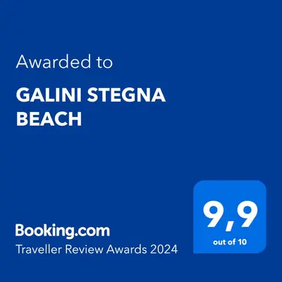 a blue text box with the words awarded to gilinn stegana beach at GALINI STEGNA BEACH in Archangelos