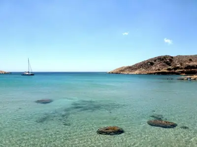 a view of the ocean with rocks in the water at The Citrus House in Kalavárda