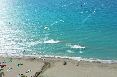 an aerial view of a beach with people in the water at FANES HOUSE in Phanaes