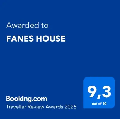a blue sign that says awarded to a games house at FANES HOUSE in Phanaes