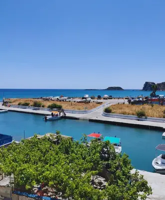 a view of a river with boats in the water at Thalassia Avra Stegna Beach in Archangelos