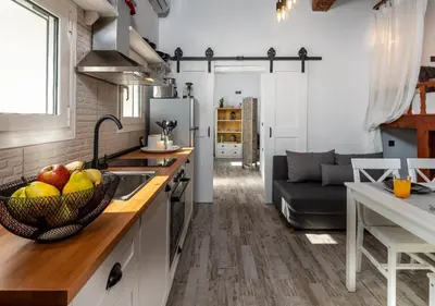 a kitchen with a bowl of fruit on the counter at Lotza Traditional House Salakos in Sálakos