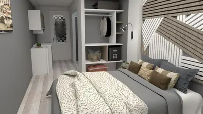 a bedroom with a large bed with pillows at RHODIAN TREASURE Spiridione studio 1 in Faliraki
