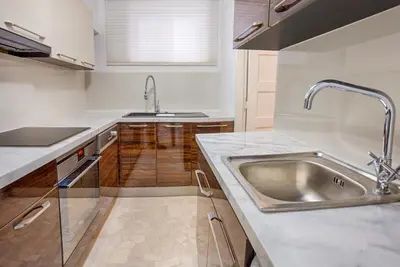 a kitchen with a stainless steel sink and a counter at Luxury Living Nisos Vs Rhodes town in Rhodes Town