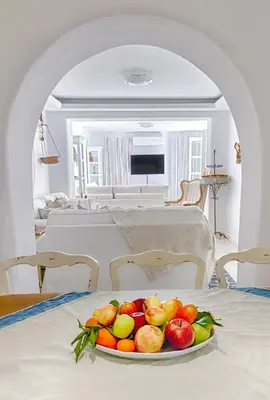 a plate of fruit on a table in a room at Luxury Living Nisos Vs Rhodes town in Rhodes Town
