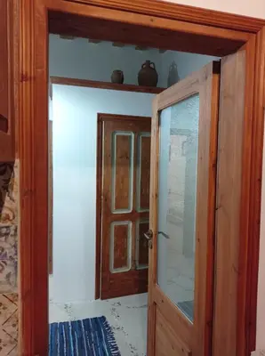 an open door in a room with a window at Anastasia's Home in Émbonas