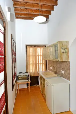 a kitchen with a sink and a counter top at Meandros Suite in Old Town in Rhodes Town