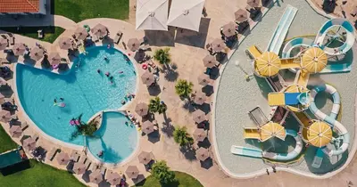 an overhead view of a pool at a theme park at Blue Sea Island in Kolimbia