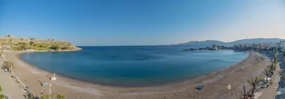 an aerial view of a beach with blue water at Haraki Elegant View in Haraki