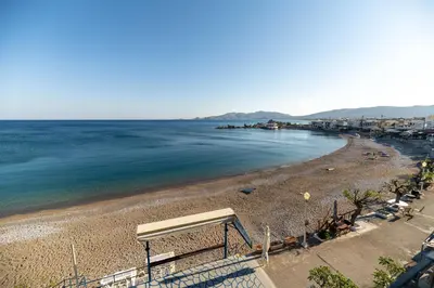 a view of a beach with the ocean at Haraki Elegant View in Haraki