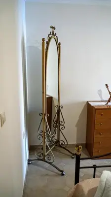 a dressing room with a mirror and a dresser at Villa Astradeni Symi in Symi