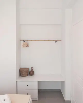 a room with white walls and a white desk at Alykes Beachside Stylish Villas with Private Pool South Rhodes in Lachania