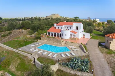 an aerial view of a house with a swimming pool at Villa Krokali Lindos in Líndos