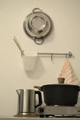 a pot and a pan on a stove with a pot at Spitaki - House with Garden by the Beach - Pefki in Pefki Rhodes