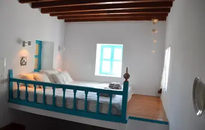 a bedroom with a bunk bed in a room at Spitaki - House with Garden by the Beach - Pefki in Pefki Rhodes