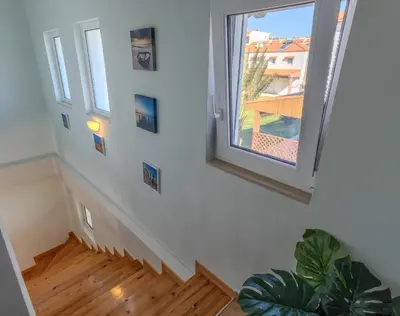 a staircase in a home with a window at Villa Christalia in Kolimbia