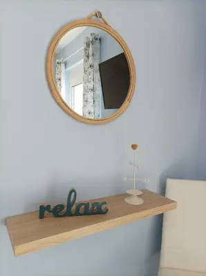 a mirror on top of a shelf in a room at Annas House Theologos in Theologos
