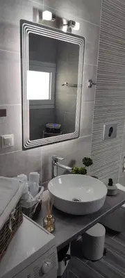 a bathroom with a white sink and a mirror at Annas House Theologos in Theologos