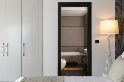 a bathroom with a toilet and a bath tub at Alindo Villa I in Líndos