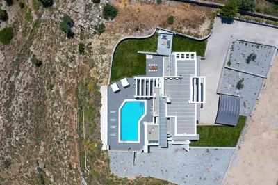 an overhead view of a house with a swimming pool at Alindo Villa I in Líndos