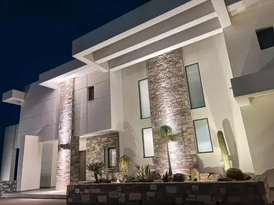 a rendering of a house at night at Alindo Villa I in Líndos
