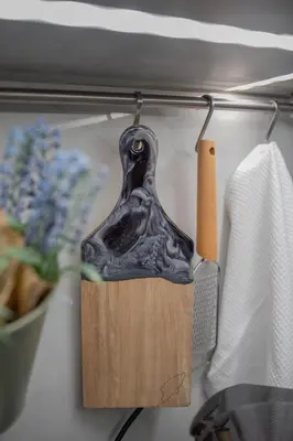 a black and wooden knife holder in a refrigerator at Inconceptual apartment in Paradeísion