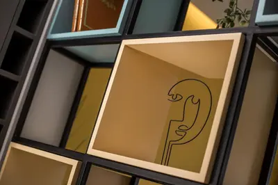 a window with a drawing of a detainee at GM Apartments-Rhodes Luxury Living in Kalithies