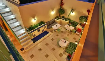an overhead view of a restaurant with tables and chairs at Efchi 1904 in Rhodes Town