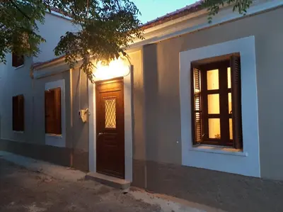 a house with a door and a window at DIMITRA HOUSE in Rhodes Town
