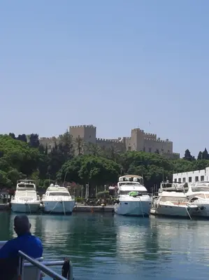a group of boats are docked in a harbor at DIMITRA HOUSE in Rhodes Town