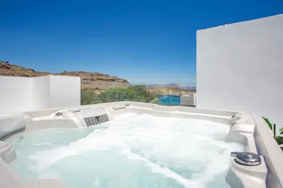 a hot tub in a room with a view at Villa Euphrosyne in Líndos