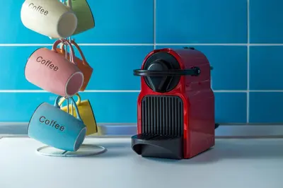 a couple of tags hanging from a fire extinguisher at Villa Euphrosyne in Líndos