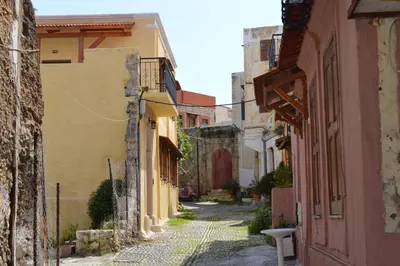 an alley in an old town with buildings at Summer Knights in Rhodes Town