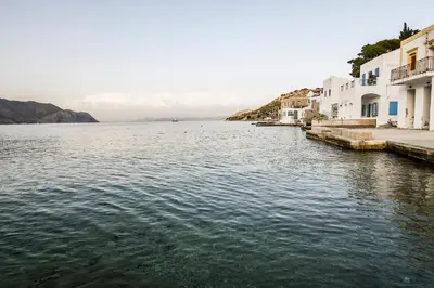 a view of a body of water with buildings at Ponente in Symi
