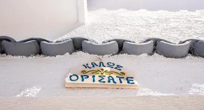 a sign on the floor of a house at Traditional Dream House in Soroni