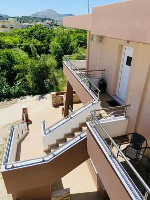 a set of stairs leading up to a house at Escape Rooms in Afantou