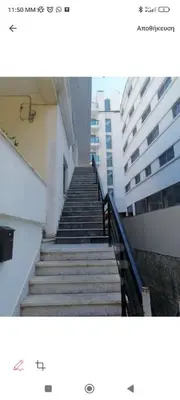 a view of a staircase in a building at Great Living in Rhodes Town