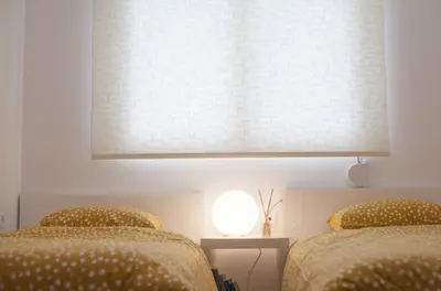 two beds sitting next to each other in a bedroom at Great Living in Rhodes Town