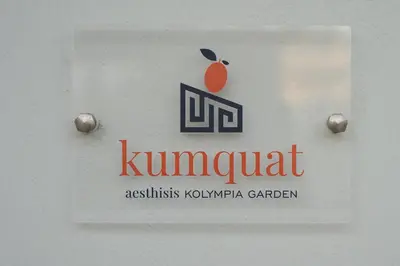 a sign with an apple on the side of a door at Aesthisis Sensational Accommodation in Kolimbia
