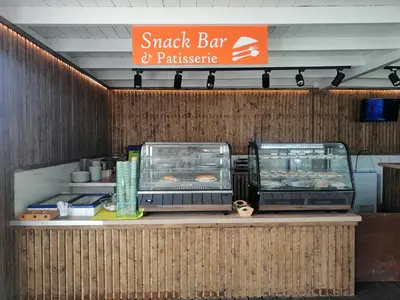 a snack bar and pancake at Villa Mare by Delfinia Resort in Kolimbia