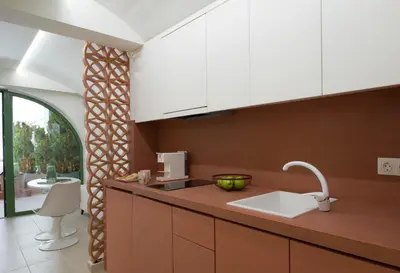 a kitchen with a sink and a counter top at Central Grinn-in the heart of Rhodes,new&stylish! in Rhodes Town