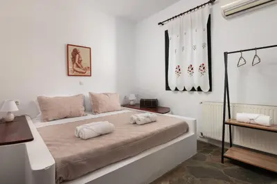a bedroom with a bed with two pillows on it at Pure Nature Cottage in Láerma