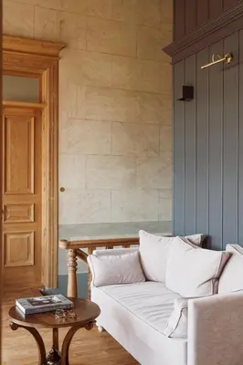 a living room with a white couch and a table at Saray Monumental Luxury Villa Medieval Town, Rhodes in Rhodes Town