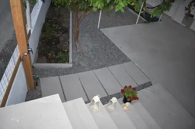 an overhead view of a patio with shoes and a plant at Pervoli in Faliraki