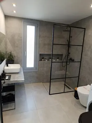 a bathroom with a shower and a sink at Casa di Rea Sanfilippo in Soroni