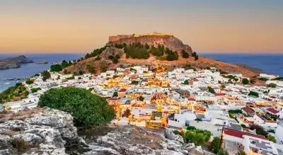 a view of a town on a mountain at Toulipa Lindos in Líndos