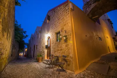 an alley in an old town at night at SOFI'S house in Rhodes Town