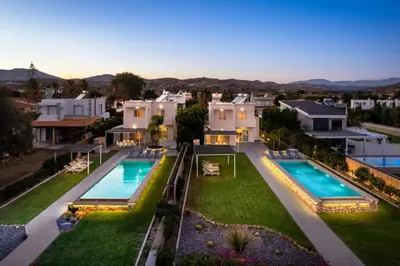 an aerial view of a house with two swimming pools at Sea Homes Villas- Villa Alberto in Kiotari
